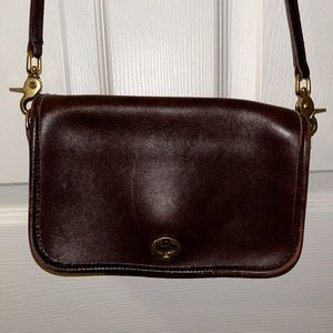 Coach Vintage leather purse. Black leather with metal twist closure.